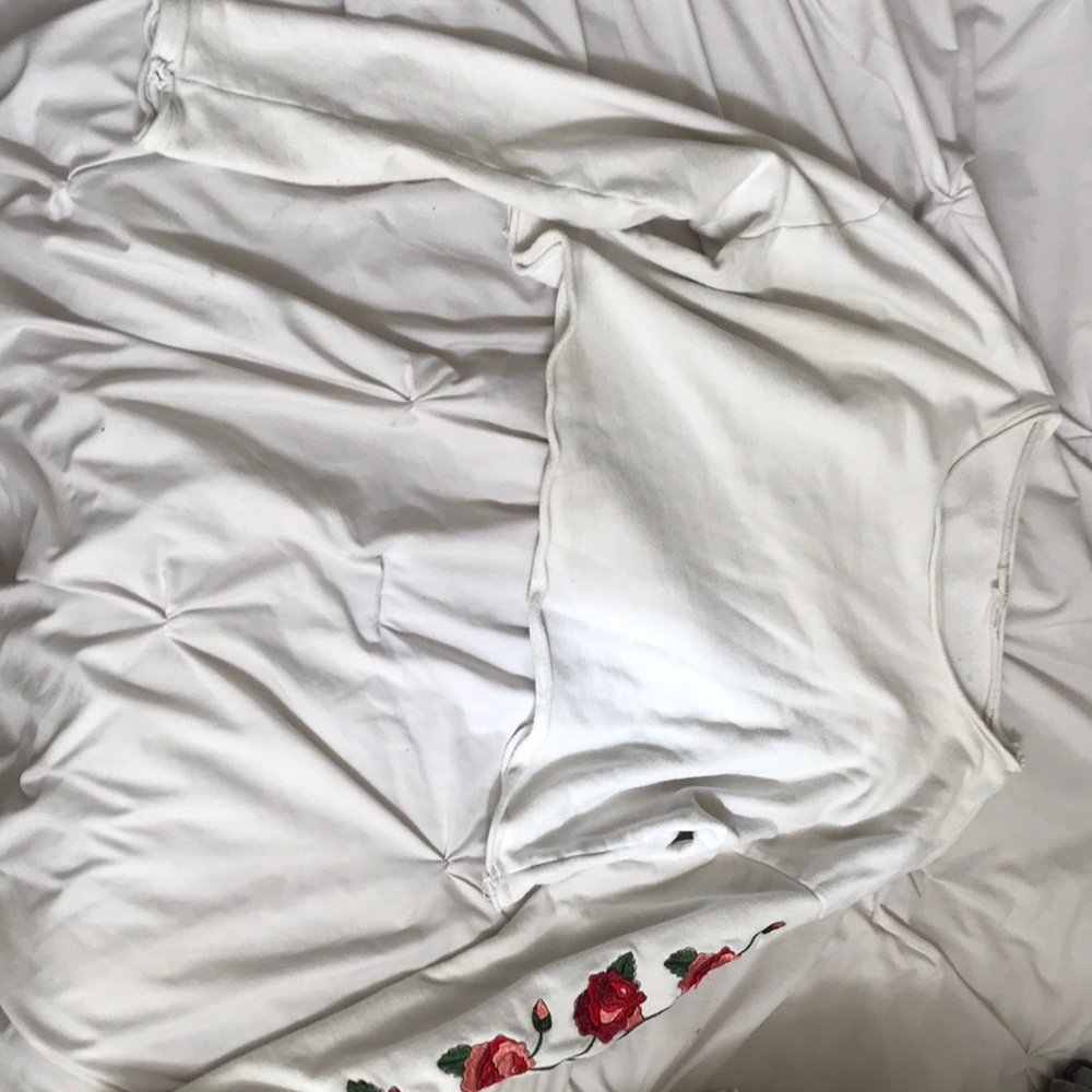 white cropped sweater with roses down sleeve